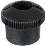 Black cylindrical object with textured surface on a white background