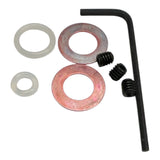 Set of mechanical components including washers and a wrench on a white background